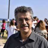 �Ci battezziamo in maniera pubblica: questo modo di fare si chiama �evangelizzazione�, cio� diffusione della buona notizia�, ci dice il pastore Giovanni Caito, che con i suoi baffi e occhiali tondi ci ricorda tanto Ned Flanders, il religiosissimo vicino di casa di Homer Simpson 